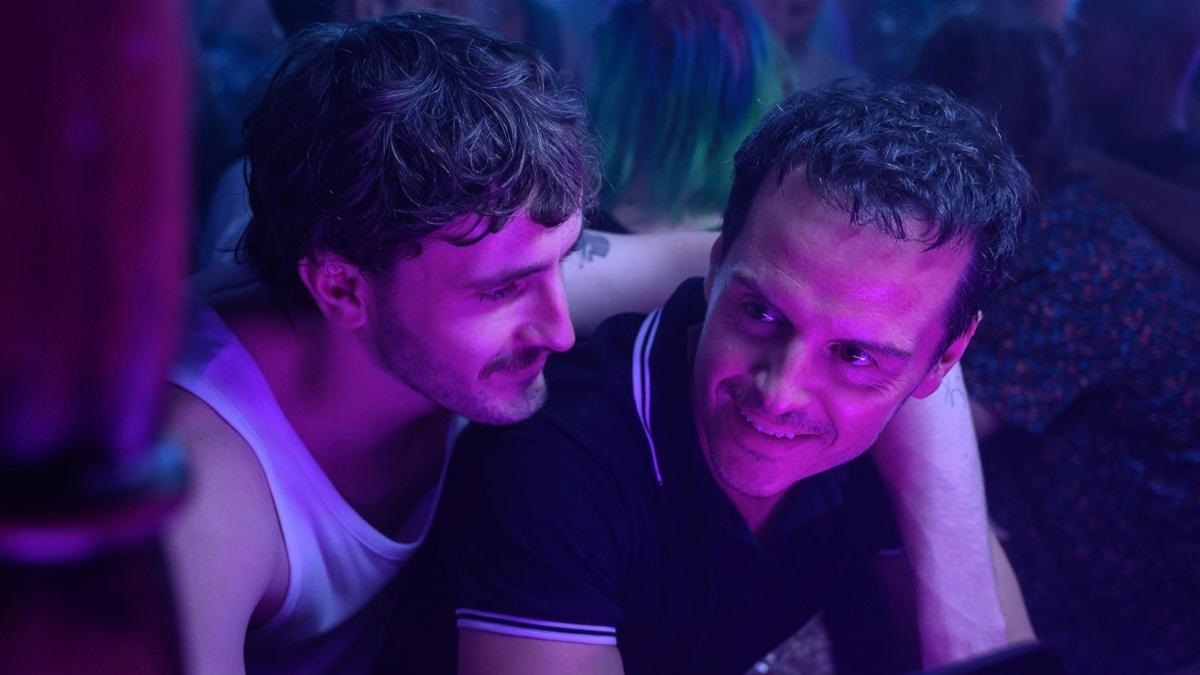Paul Mescal and Andrew Scott cuddle in purple light in "All of us Strangers"