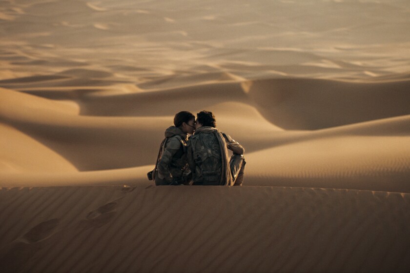Zendaya and Timothée Chalomet kiss in the desert in Dune 2