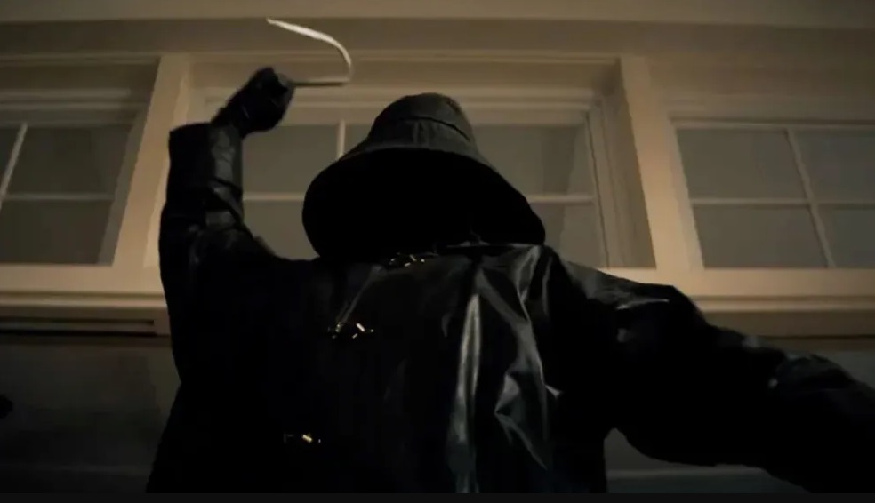 The hooded fisherman wields his hook in "I Know What You Did Last Summer".