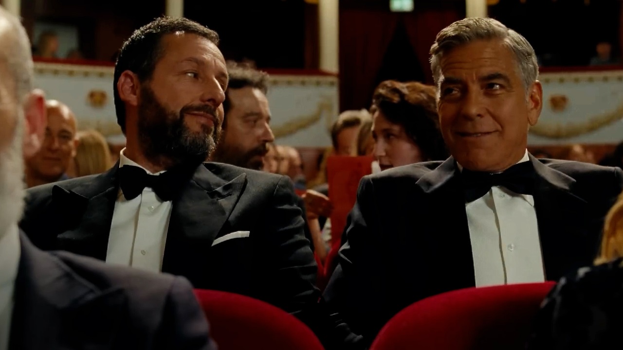 Ron (Adam Sandler) and Jay (George Clooney) attend a posh event in Jay Kelly, a Netflix production.