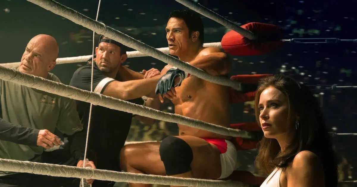 Mark Kerr (Dwayne Johnson) sat in the corner during a bout in The Smashing Machine.