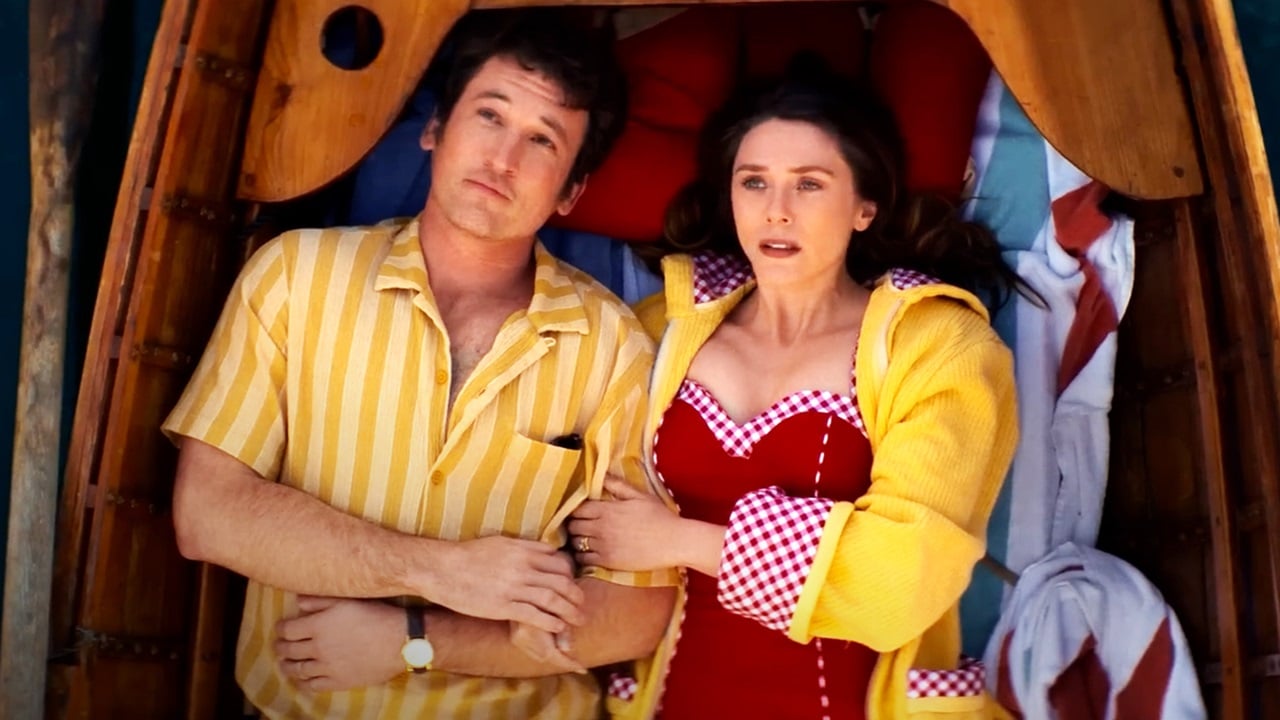 Larry (Miles Teller) and Joan (Elizabeth Olsen) contemplate life and death while floating on the sea in a rowing boat in Eternity.