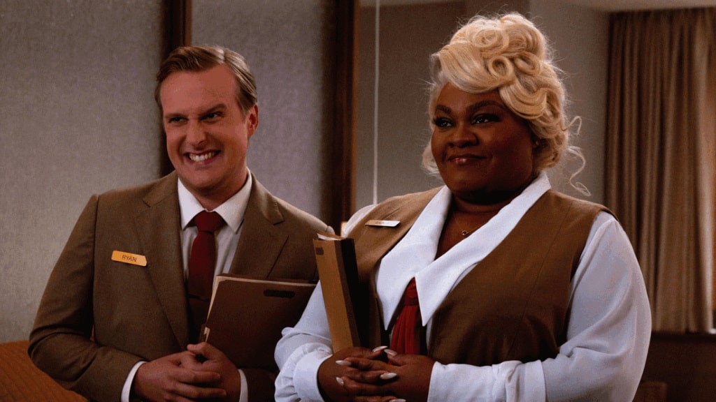 Ryan (John Early) and Anna (Da'Vine Joy Randolph) as AC's, trying to link their clients to their perfect after-lifes in Eternity.