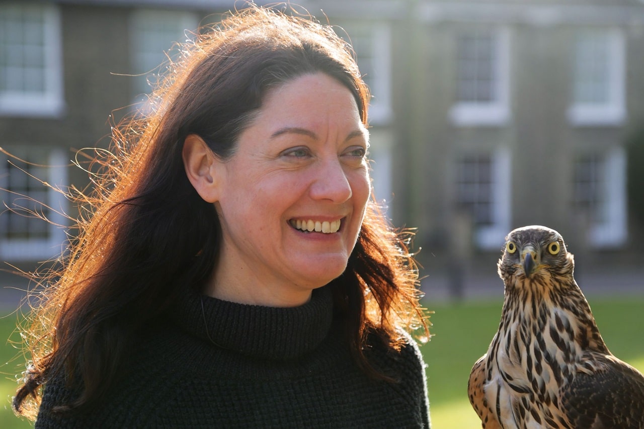 Author of the book "H is for Hawk", Helen Macdonald, holding a goshawk.
