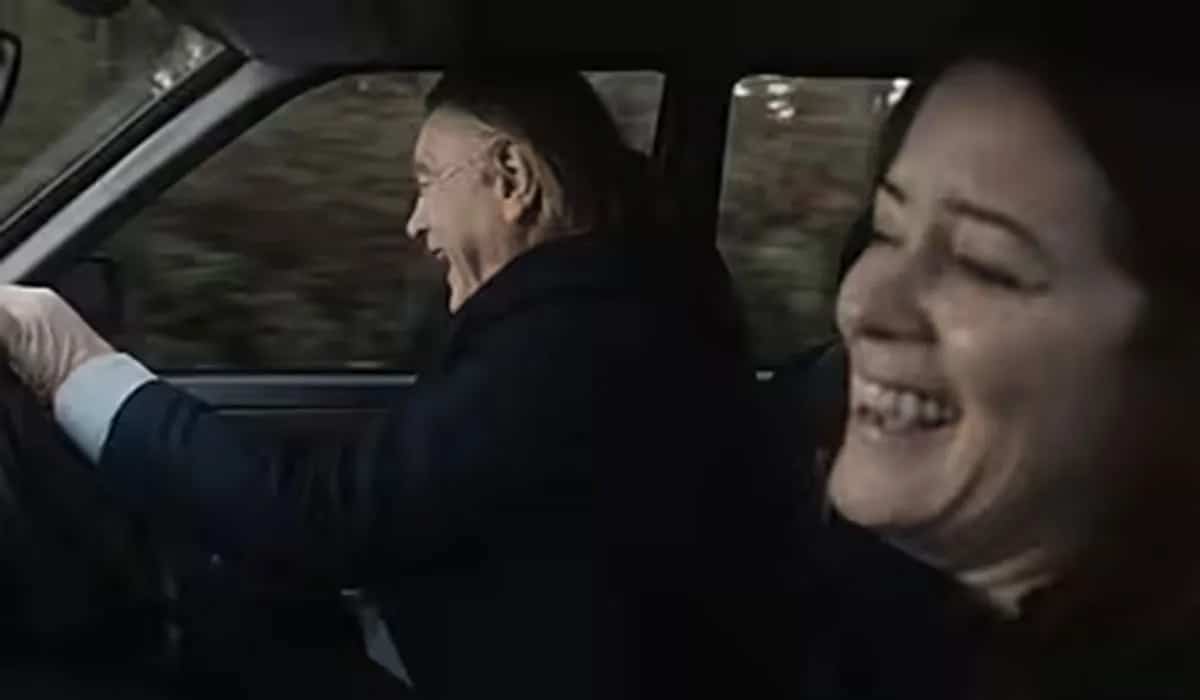 Helen (Claire Foy) shares a joke with her Dad (Brendan Gleeson) in the car.