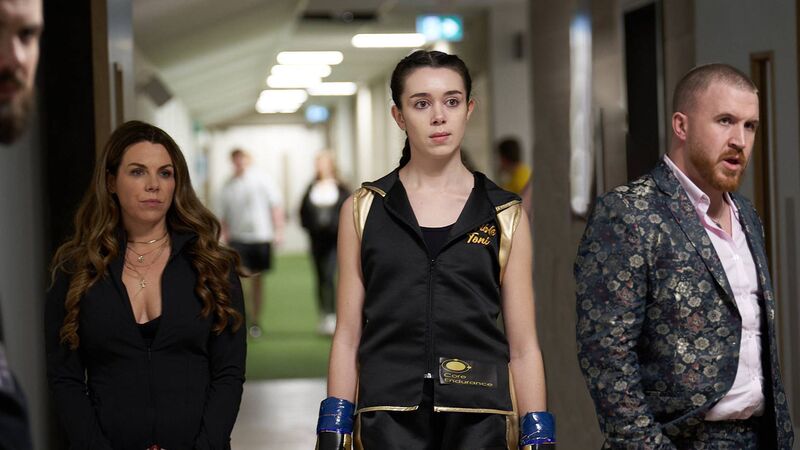 Boxer Tony (Ciara Berkeley) with Emma (Sinead O'Riordan) and Jack (Ben Condron) in the film Swing Bout.