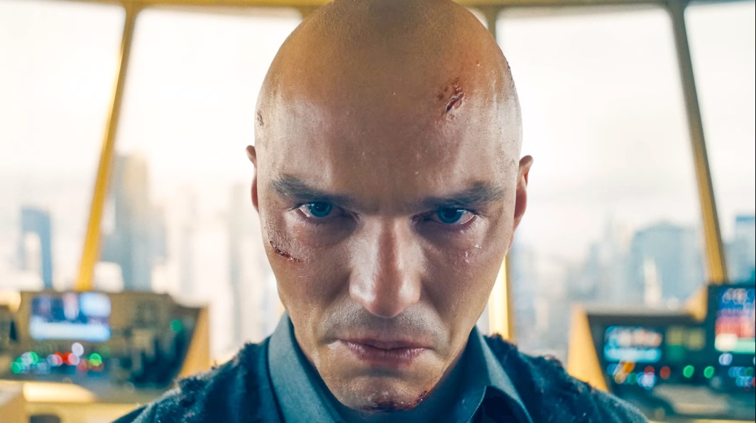 Nicholas Hoult glaring down the camera lens as Lex Luthor in Superman