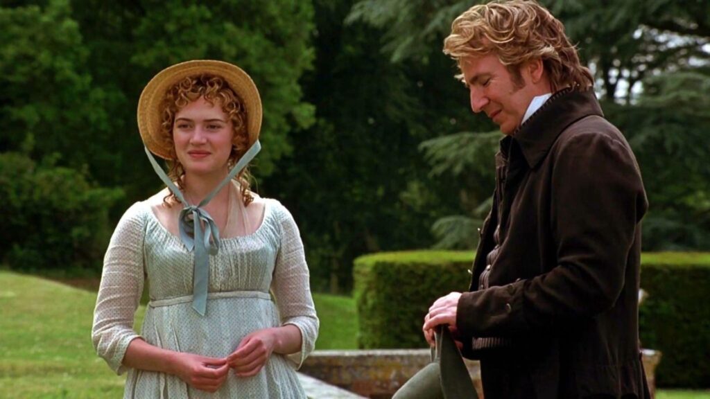 Marianne and Colonel Brandon share an awkward silence in the garden in Sense and Sensibility