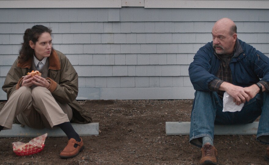 Agnes and Pete talk while eating a sandwich in Sorry Baby