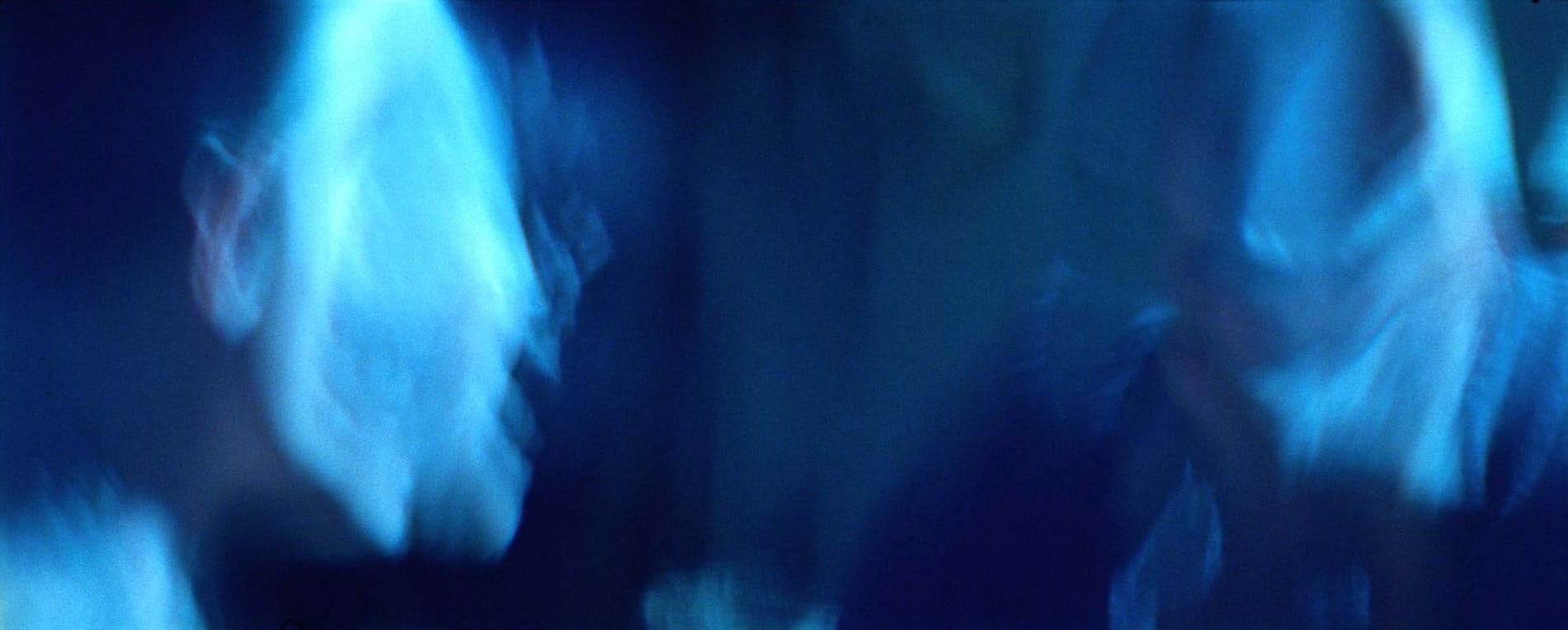 Twisted and distorted facial images in the film Balearic.