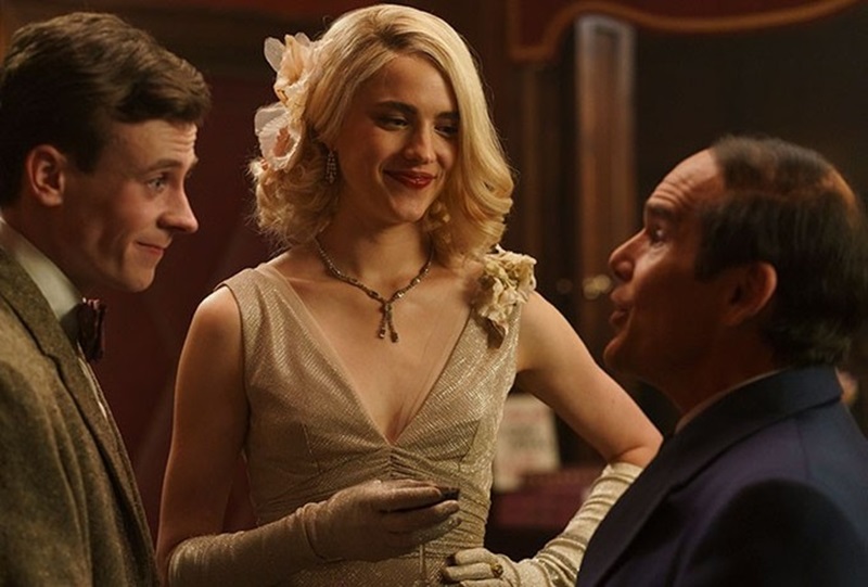 Future director George Roy Hill (David Rawle) meets Lorenz Hart (Ethan Hawke) while Elizabeth (Margaret Qualley) looks on in the Richard Linklater film Blue Moon.