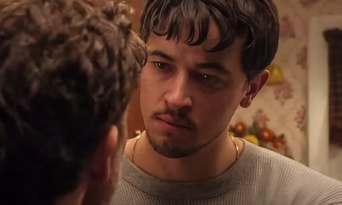 Lucas (Tom Blyth) has words with his boorish Uncle Paul (Gabe Fazio) in his mum's kitchen in the film Plainclothes