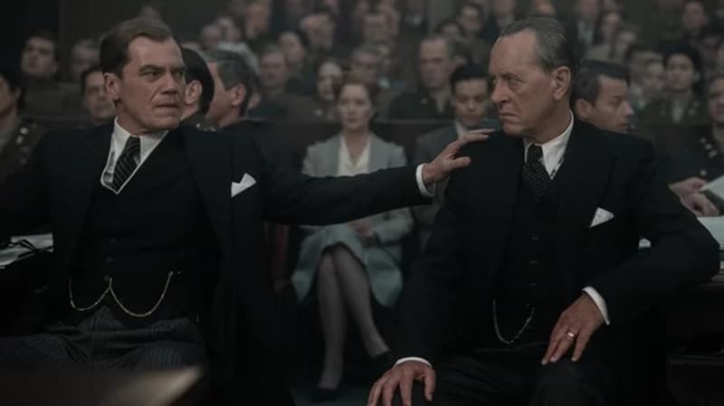Michael Shannon as Justice Robert H. Jackson and Richard E. Grant as British legal representative Sir David Maxwell-Fyfe in Nuremberg.