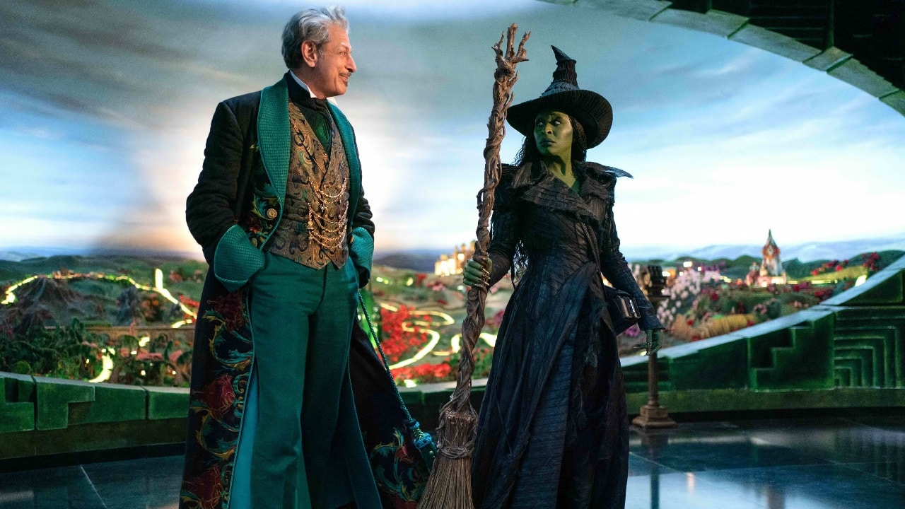 Oz (Jeff Goldblum) and Elphaba (Cynthia Erivo) stand side by side in Wicked for Good.