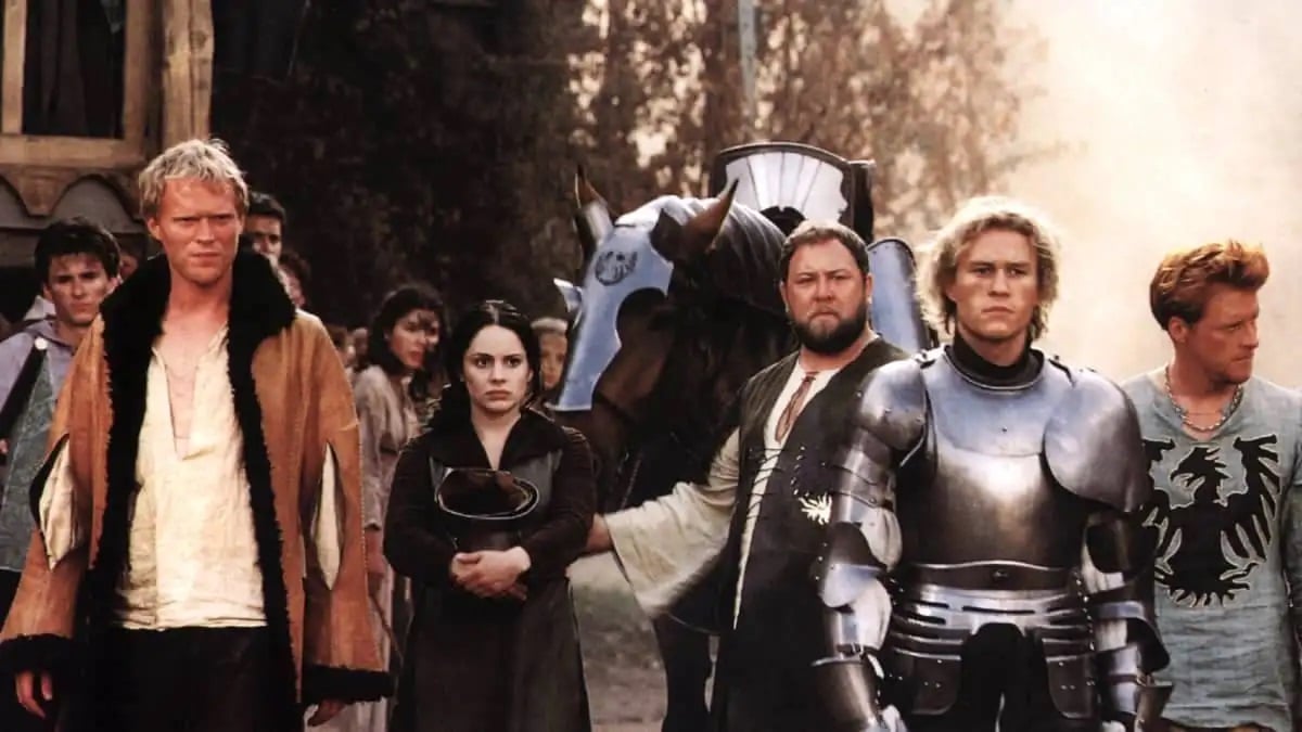 Knight Will Thatcher (Heath Ledger) stands with his band of helpers in A Knight's Tale.