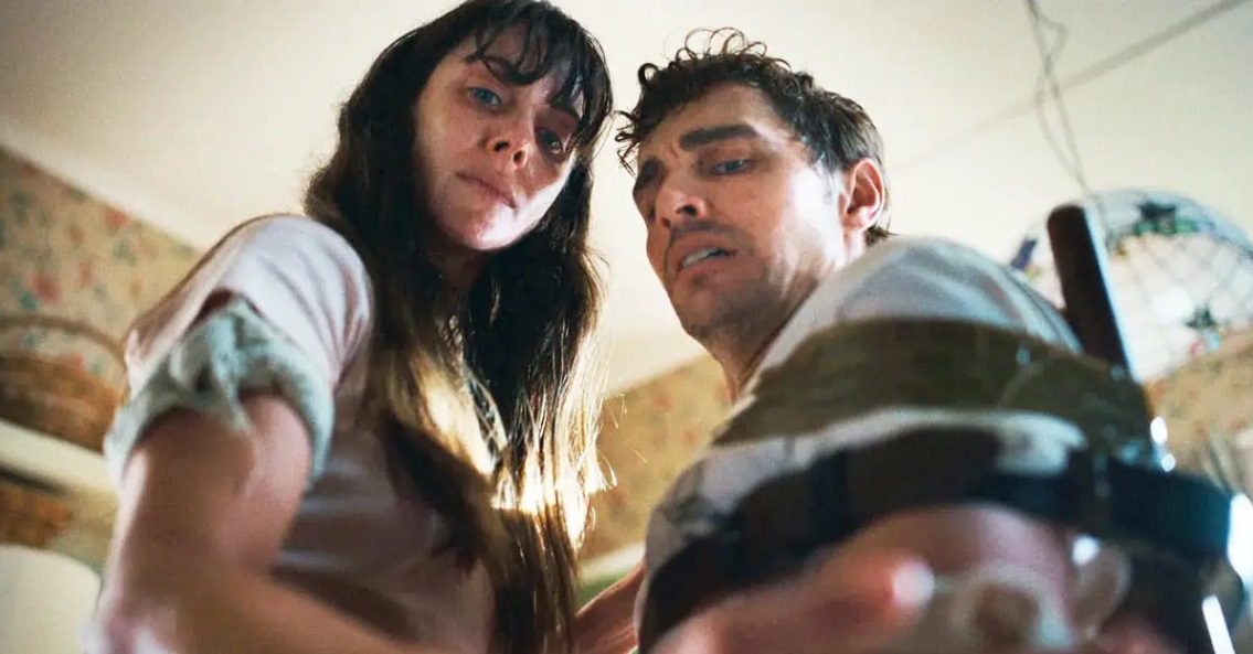 Millie and Dave stare in horror at what they are about to do in "Together".